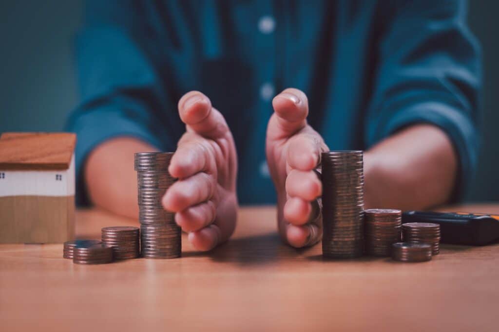 Two hands separating money